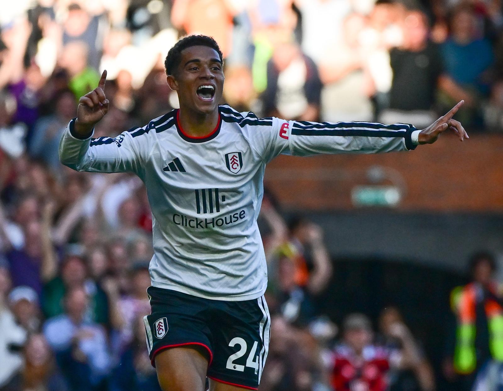 Fulham midfielder Josh King (24) celebrates Manchester United defender Lisandro Martinez (6) OG during the Premier League match between Fulham and Manchester United at Craven Cottage, London, UK on 20 September 2026.